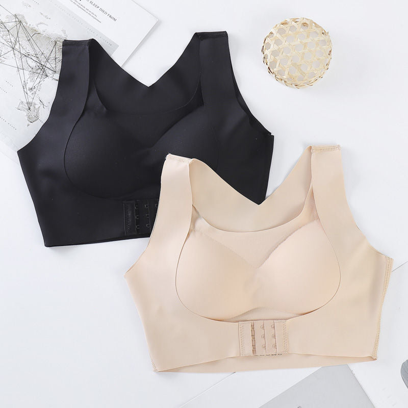 Vellure front-close support bra in black and beige, flat lay